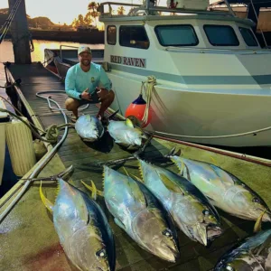 Fishermen casting lines on multi day deep sea trip