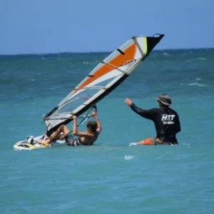 Private windsurfing lesson on clear water
