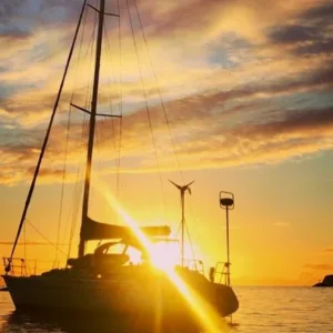 Vibrant sunset over the calm ocean horizon