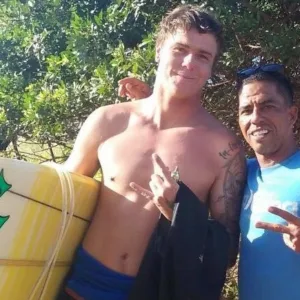 Couple enjoying a semi-private stand up paddle lesson