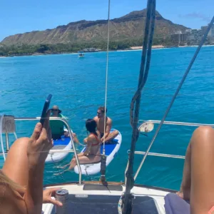 Sailing near Diamond Head with snorkeling opportunities