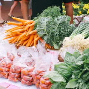 Walking tour group sampling local foods downtown Līhuʻe