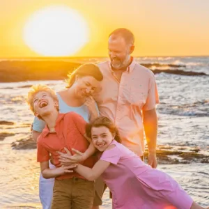 Beach portrait session during warm sunset lighting