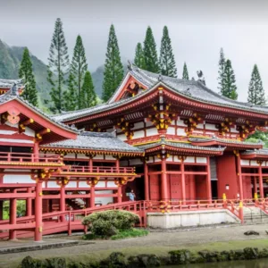 Visitors exploring hidden gems of Oahu including Byodo In temple