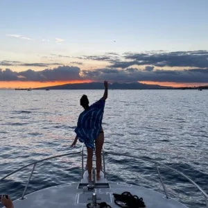 Sunset sky reflecting on ocean during whale watching tour