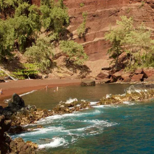 Travelers driving along scenic Road to Hana route