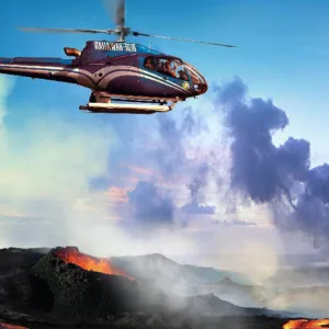 Helicopter tour showcasing waterfalls and volcanic landscapes