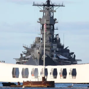 Passenger boarding shuttle from Pearl Harbor to Waikiki hotels