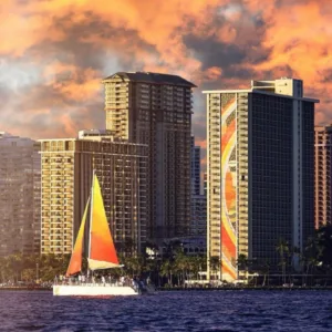 Sunset sail with passengers enjoying drinks onboard