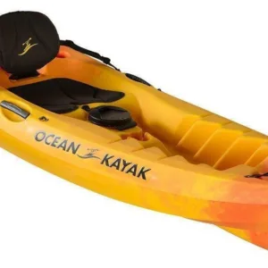 Single kayak floating on calm ocean water