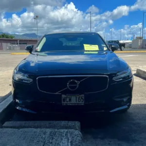 Luxury sedan waiting outside Honolulu Airport terminal