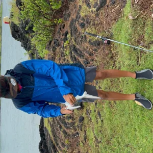 Fishing rods set up on rocky shore in Hawaii