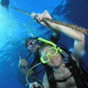 Diver preparing for open water certification dive