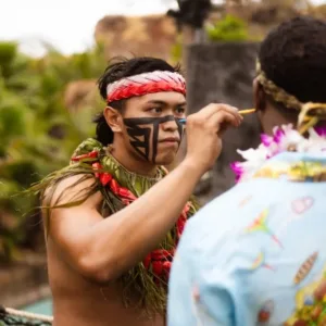 Polynesian dancers performing at luau event
