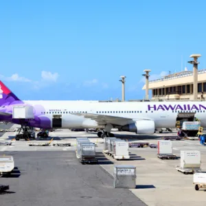 Transfer van ready at Kahului Airport for guests