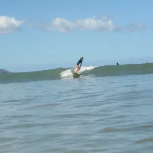 Surfer receiving private coaching during a 3-day session