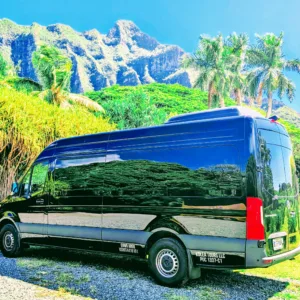 Tour van driving along Oahu coastline