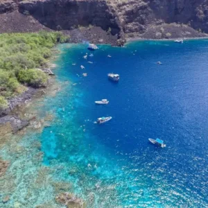 Private boat charter cruising on calm ocean waters