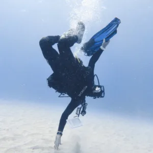 Diver practicing underwater skills during Kona course