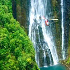 Helicopter flying over Big Island volcanic landscape