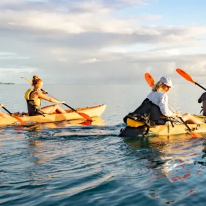 Kayakers paddling toward Mokulua Islands from Kailua Beach
