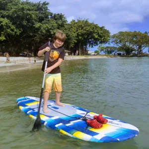 Children learning to snorkel in calm ocean waters