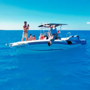 Private boat cruising along Kona coast in Hawaii