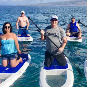 Paddlers starting morning tour on calm water