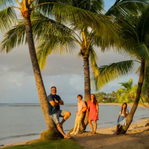 Photographer capturing candid moments on sunny beach