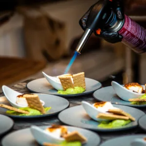 Adults enjoying five-course sushi tasting at sea