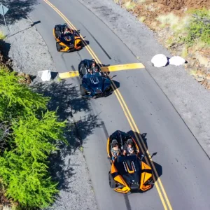 Polaris Slingshot R parked on a tropical island road