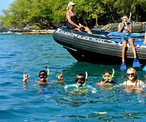 Fast boat departing Kailua Pier for Kealakekua Bay