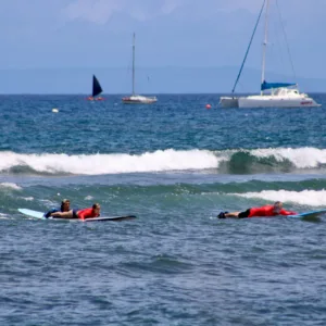 Small group preparing for semi-private surf lesson